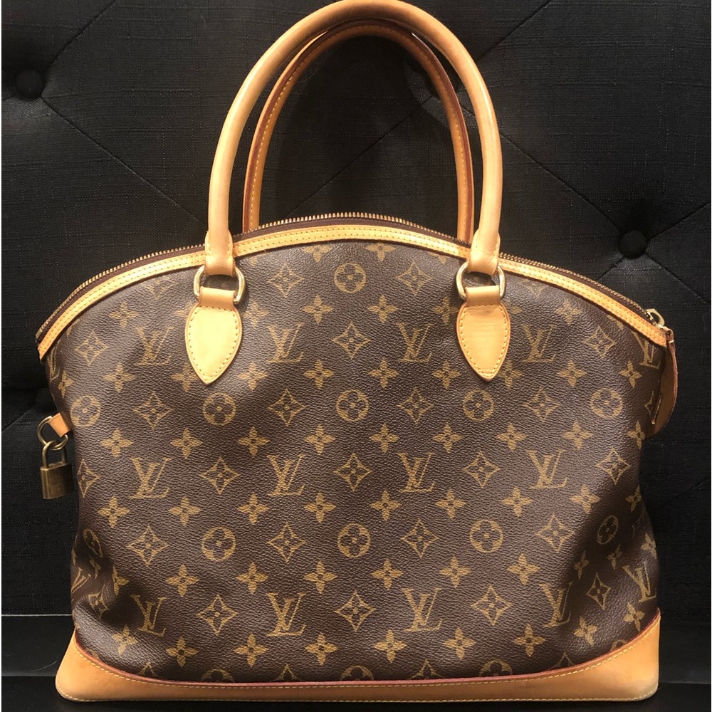 Louis Vuitton Alma Monogram Voyage Bag.  Great For mini getaway.